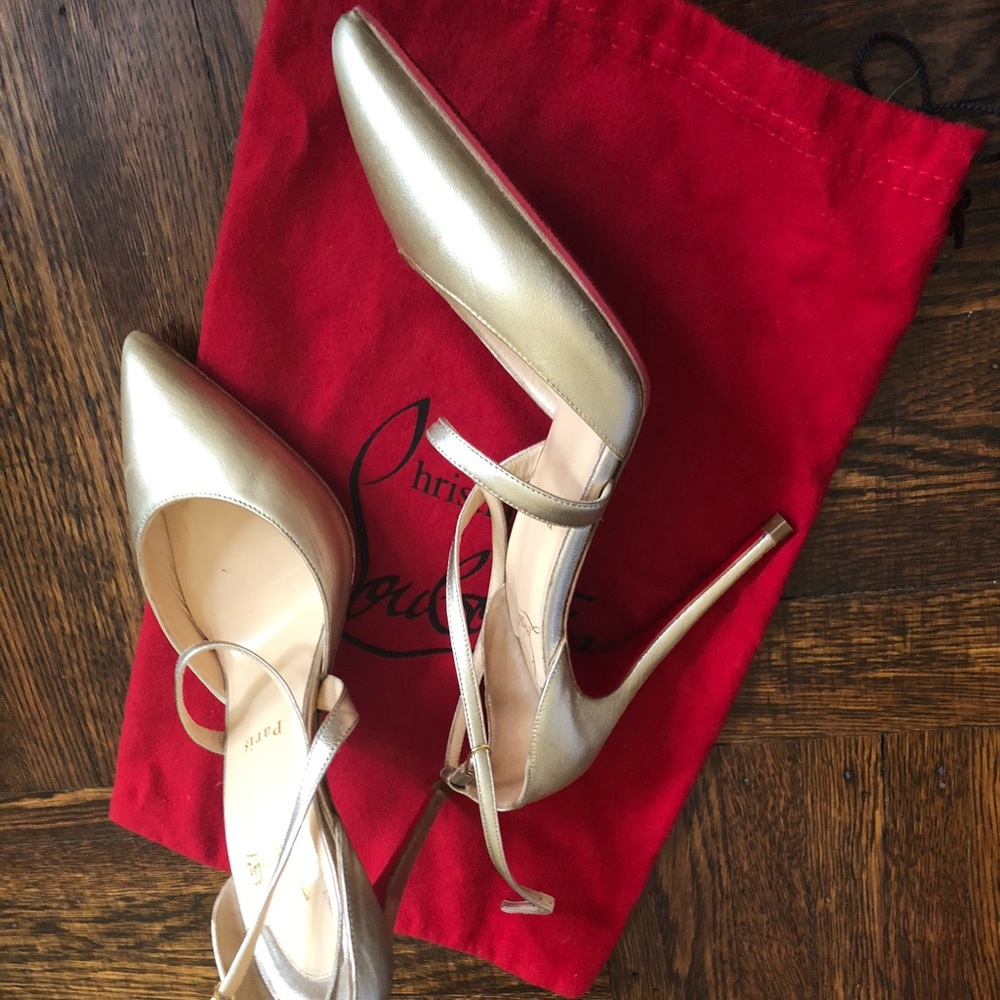 Christian Louboutin Gold Pumps